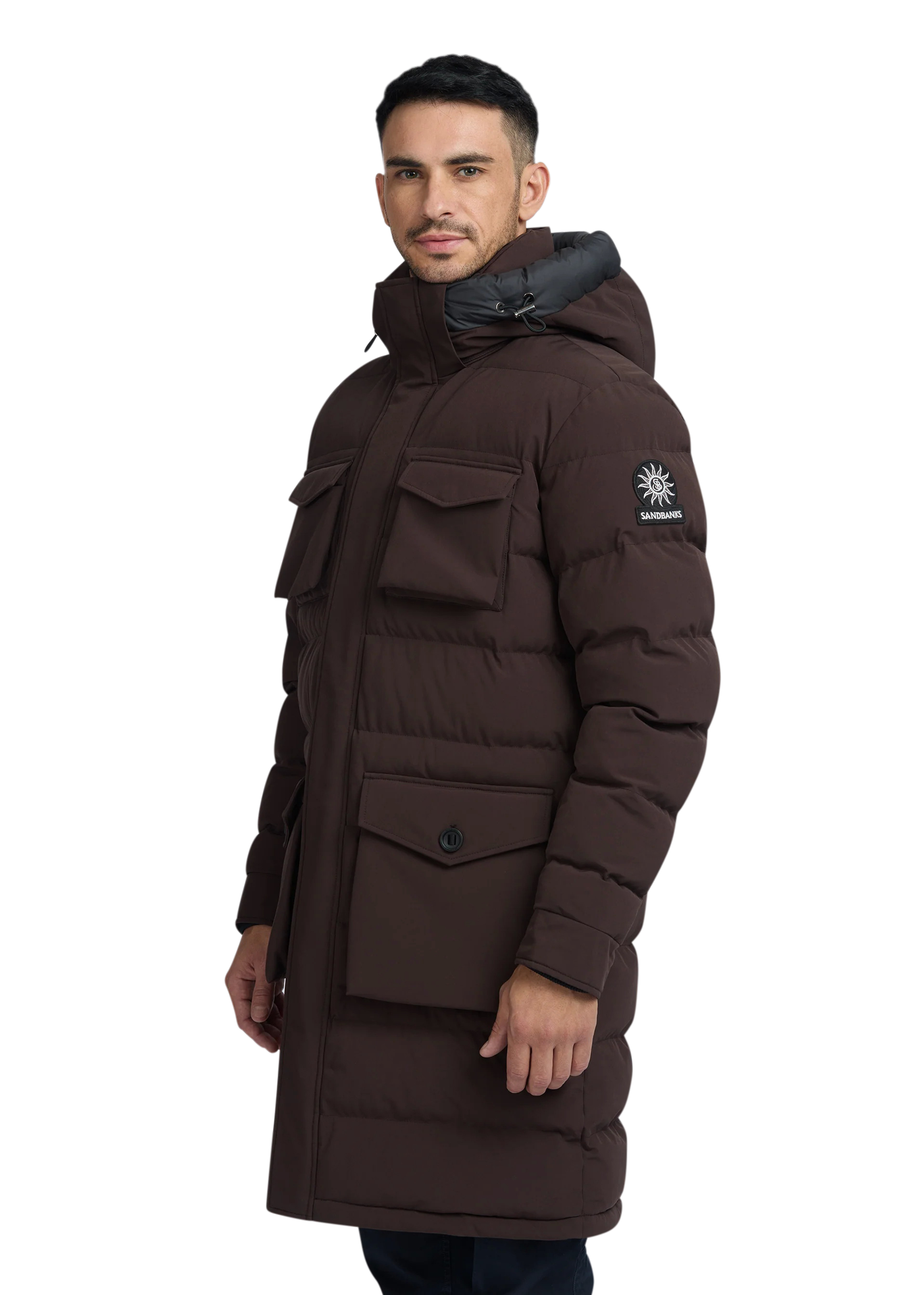 Man wearing a brown winter coat with a hood on a white background
