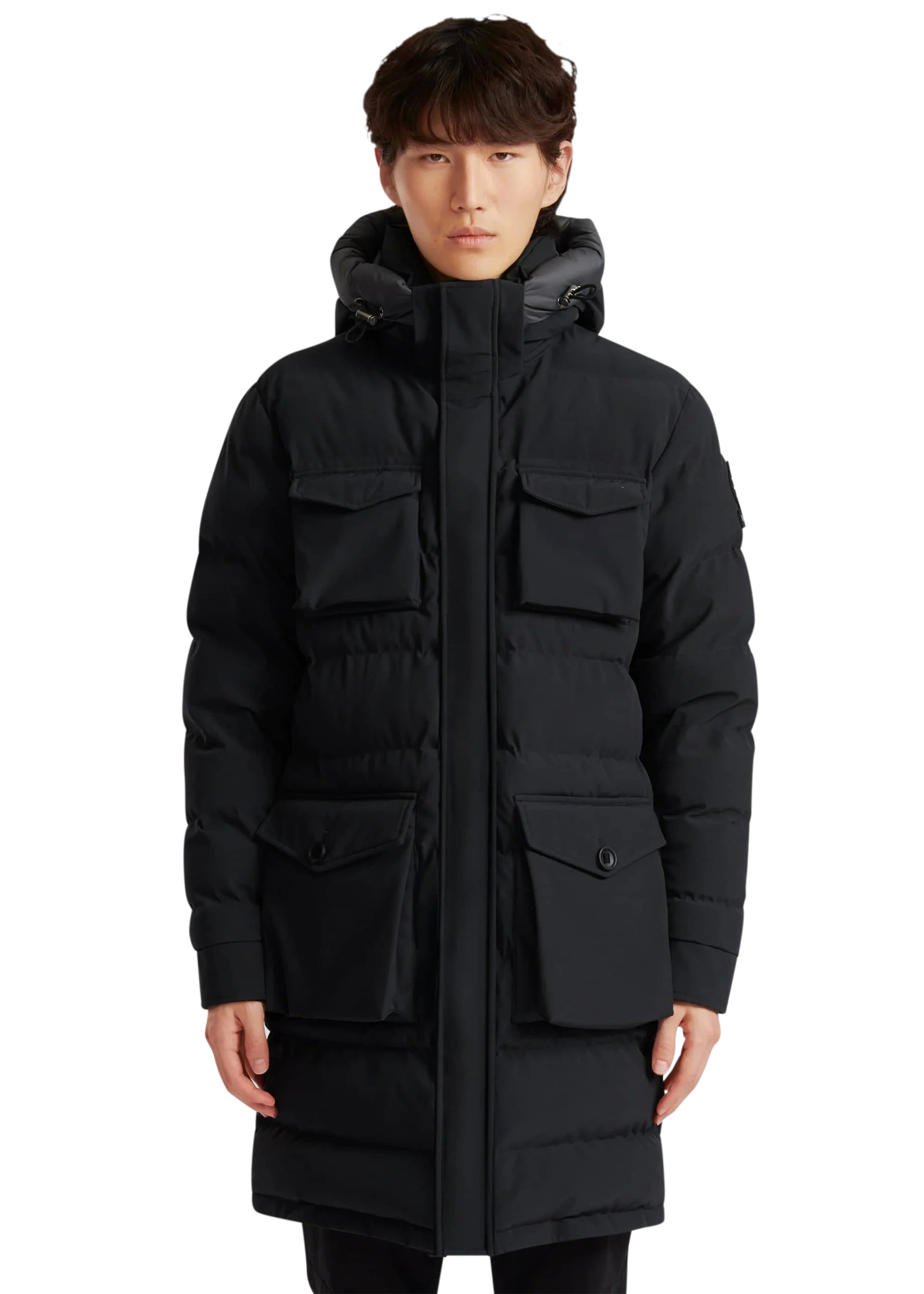 Man wearing a black winter coat on a white background