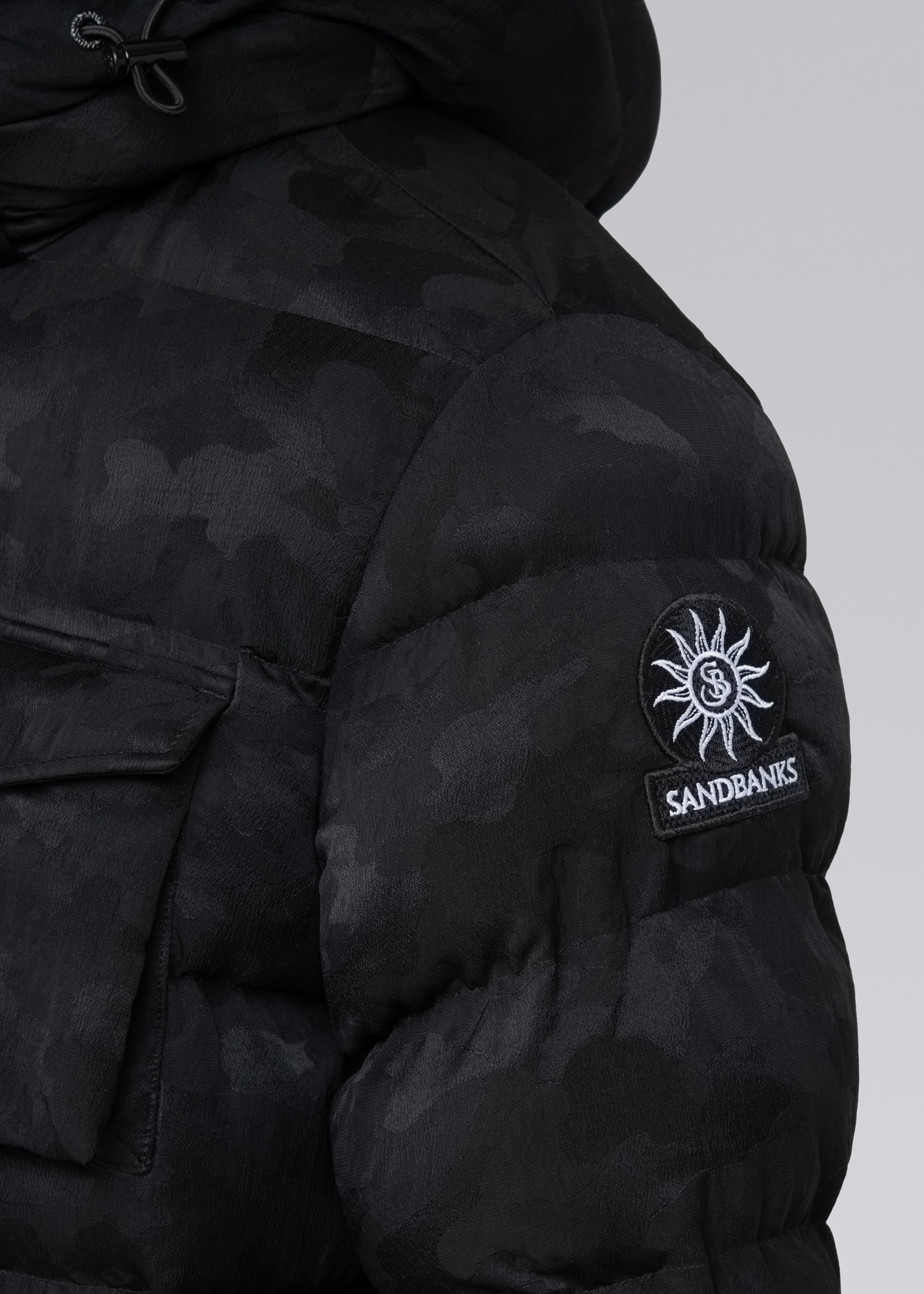 Sandbanks Carbon Collection C6 ECONYL® Branksome Long Puffer Jacket - Black Camo - Sandbanks