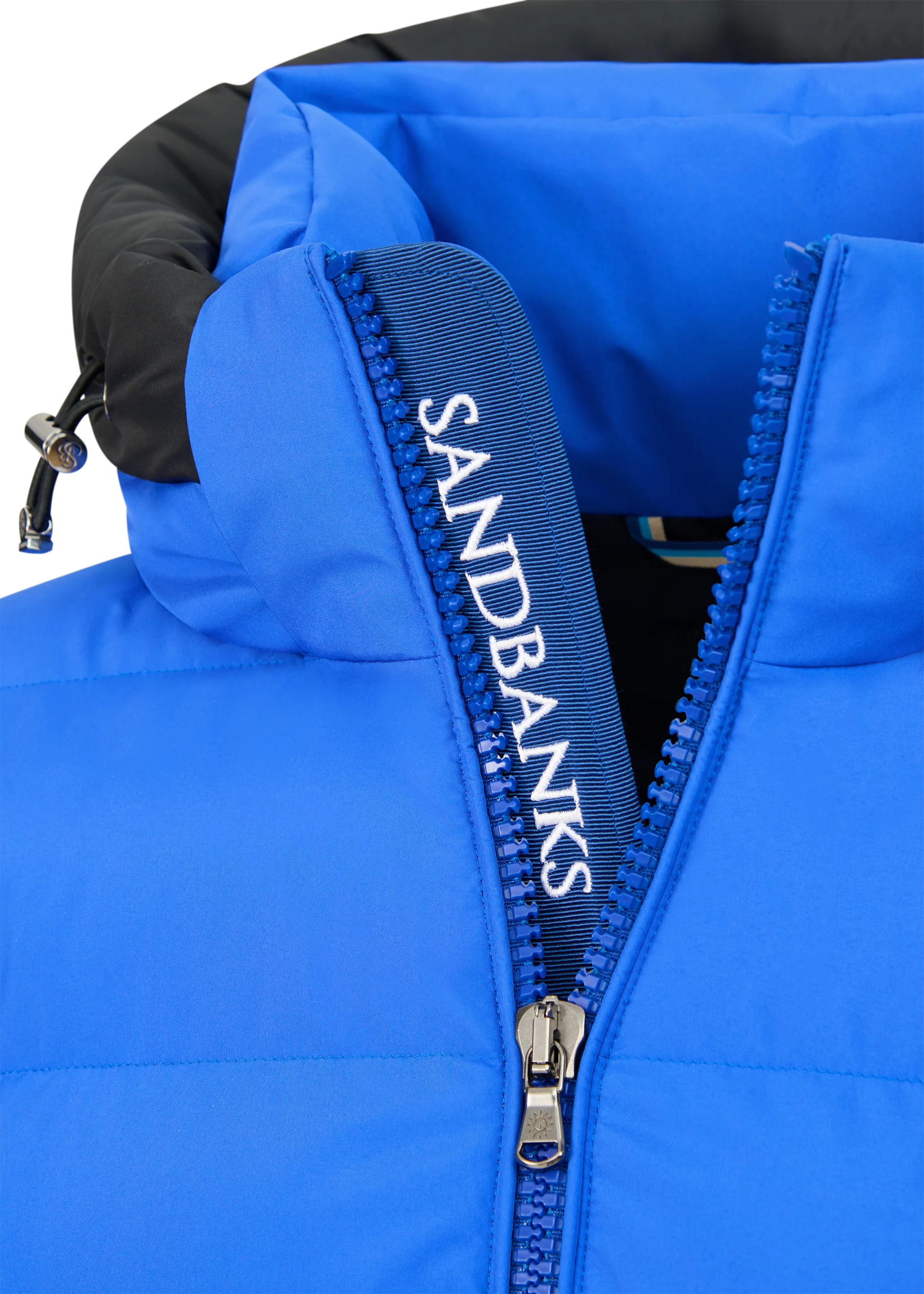 Blue puffer vest with a visible Sandbanks zipper