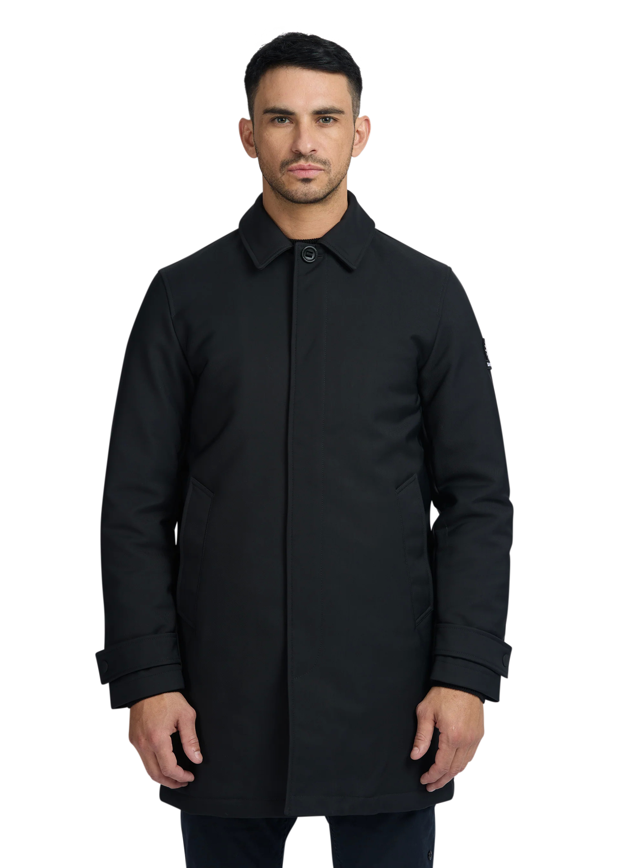 Man wearing a black coat on a white background