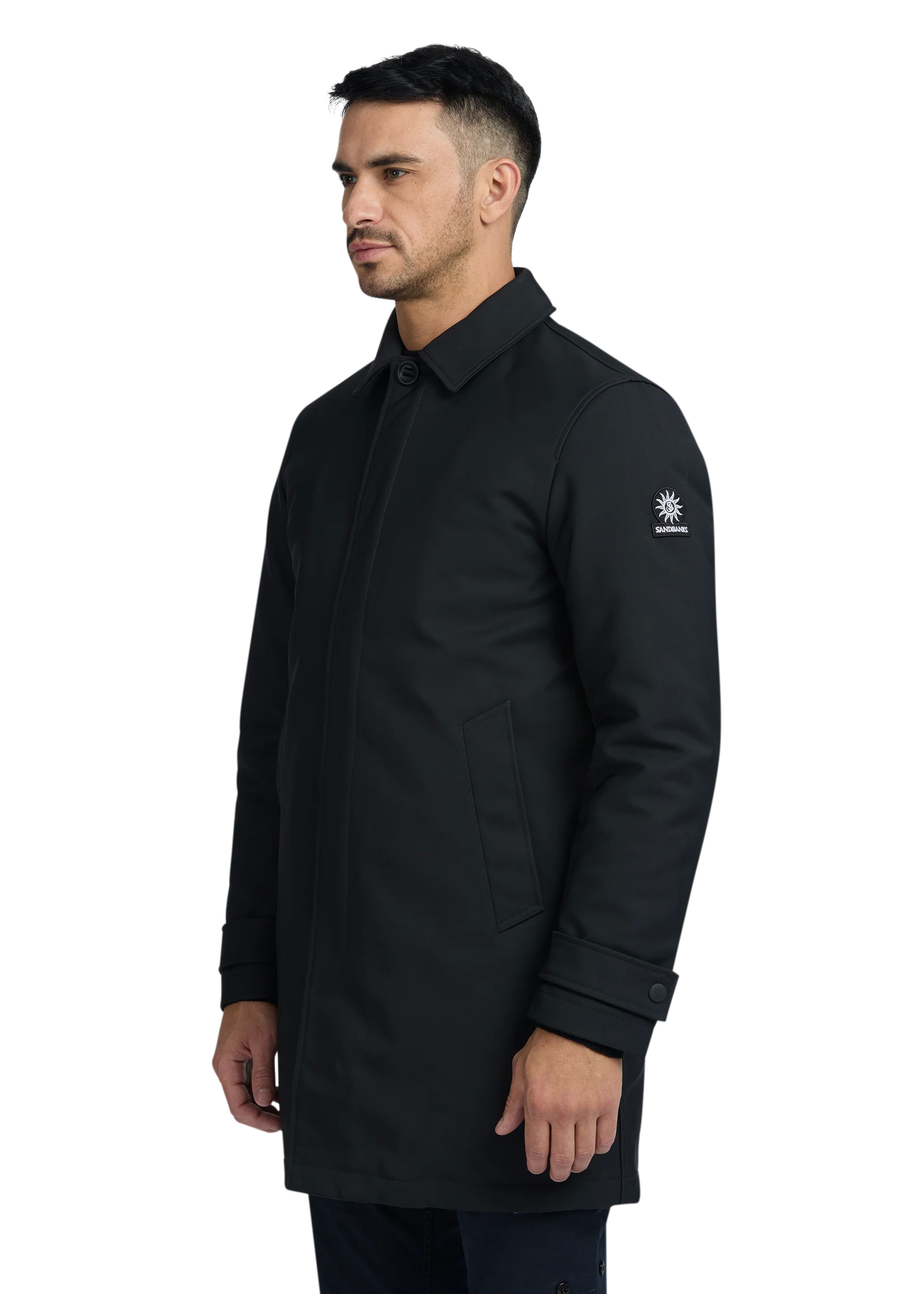 Man wearing a black coat with a brand logo on a white background