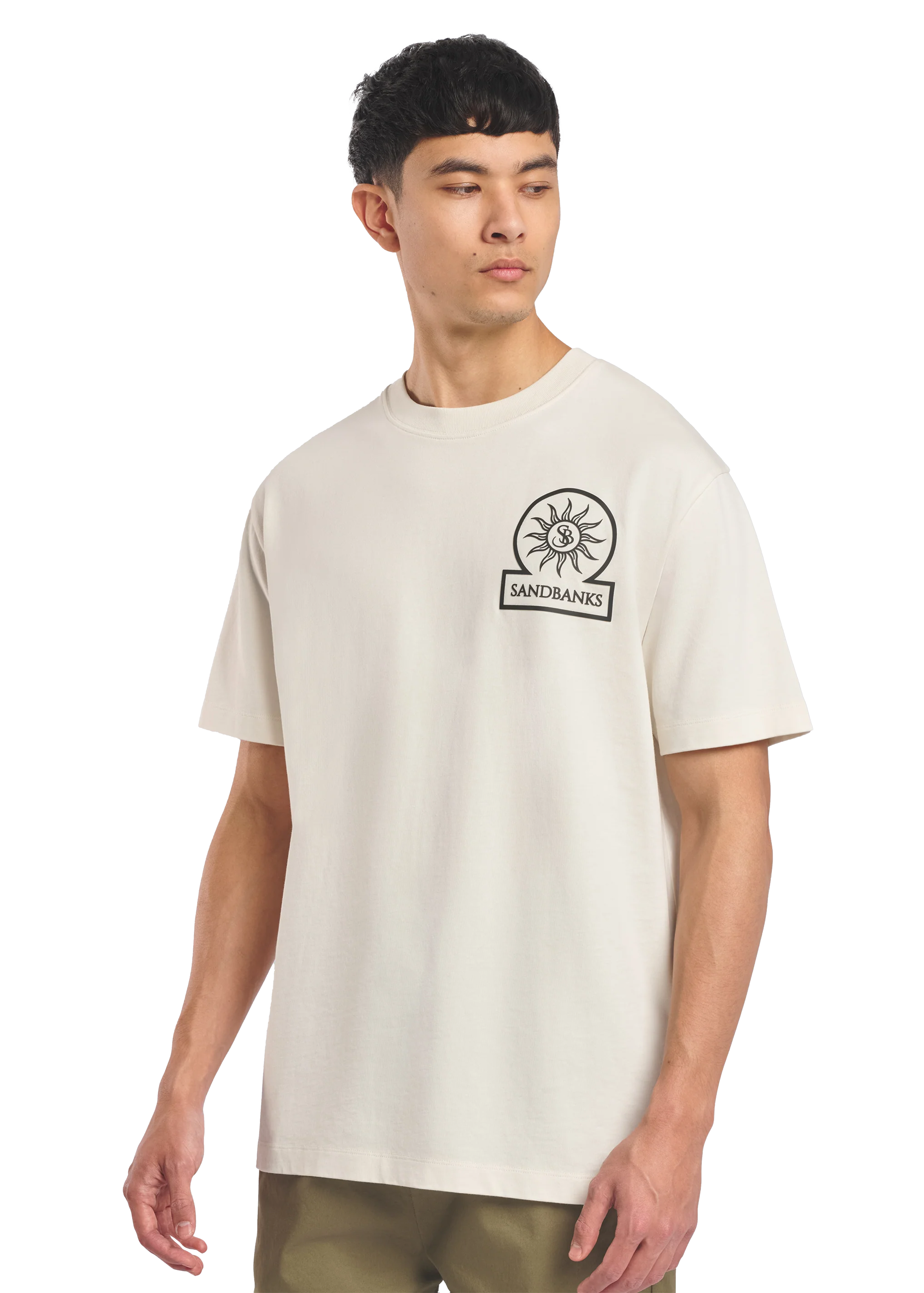 Model wearing a beige t-shirt with a logo on a white background