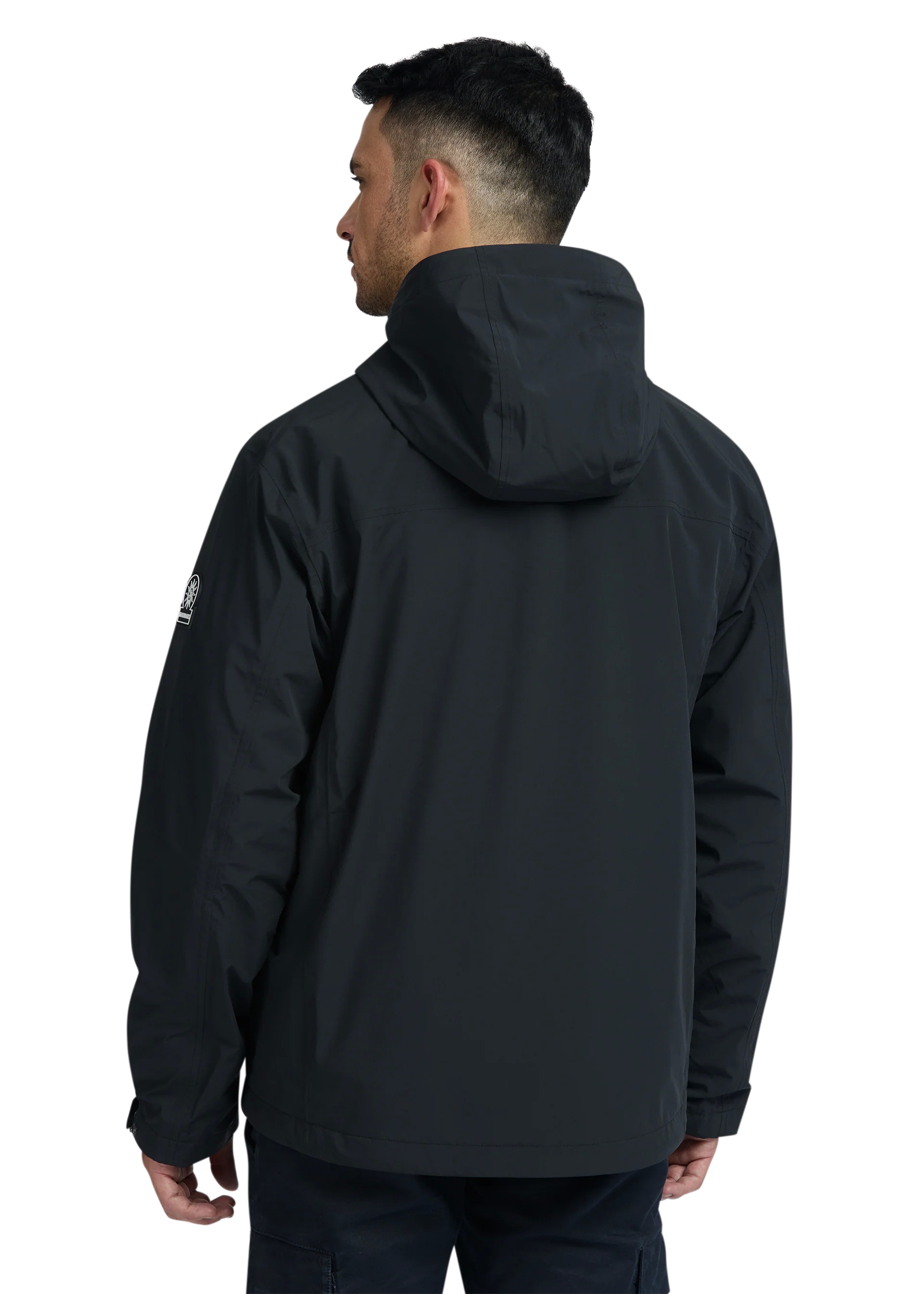 Person wearing a black jacket with a hood on a white background