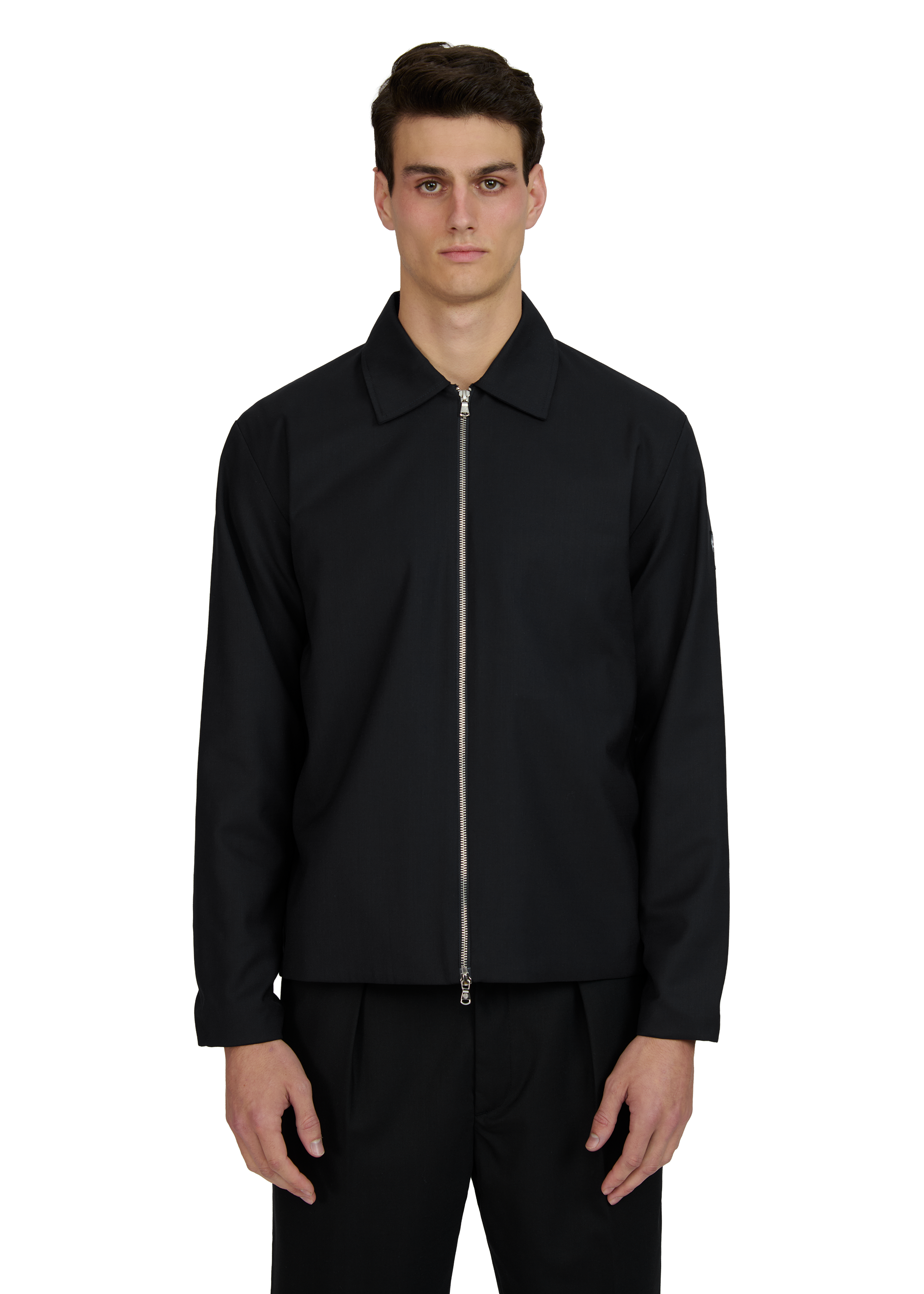 Man wearing a black jacket on a white background