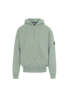 Green hoodie with a brand logo on a white background