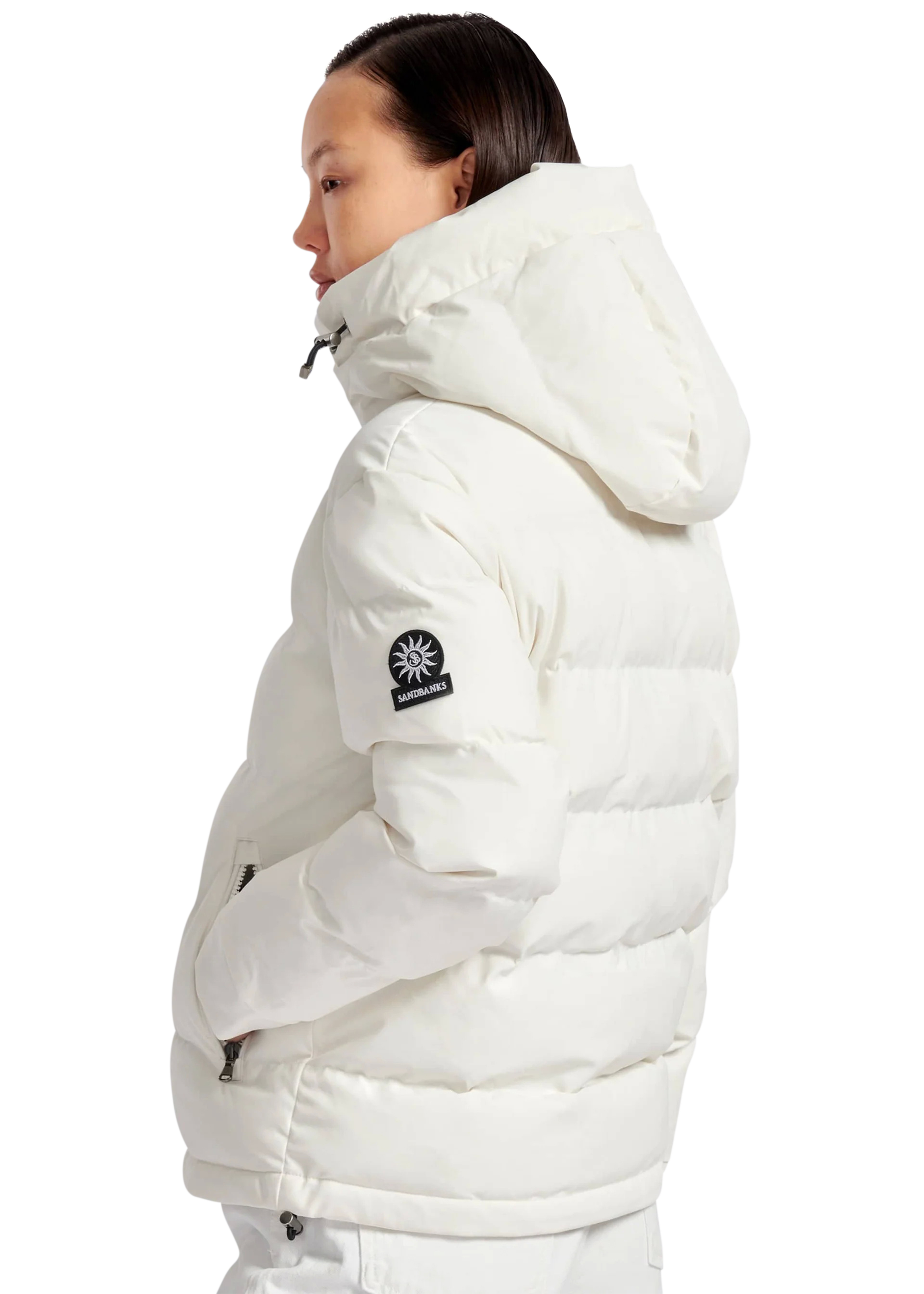 Person wearing a white puffer jacket with a brand logo on a white background