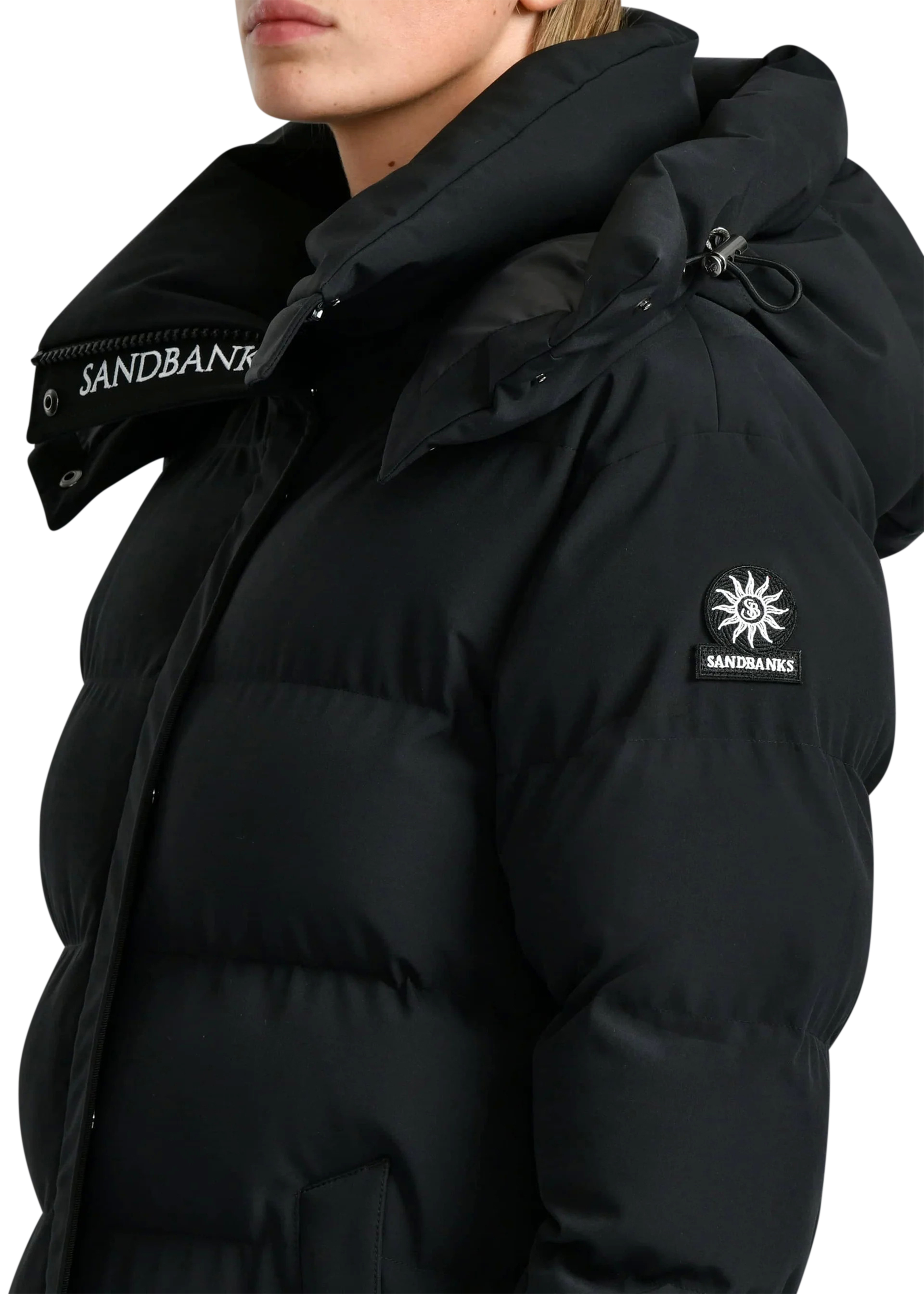 Black puffer jacket with Sandbanks branding on a white background