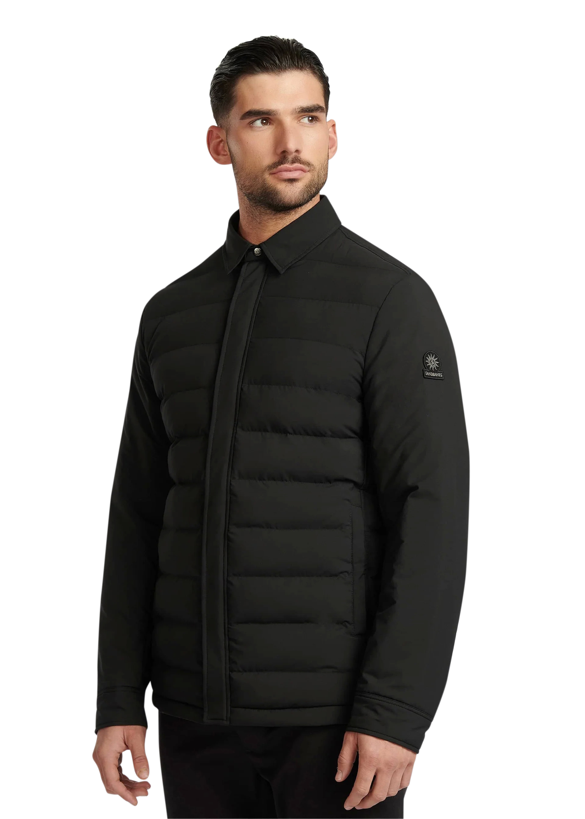 Man wearing a black puffer jacket on a white background