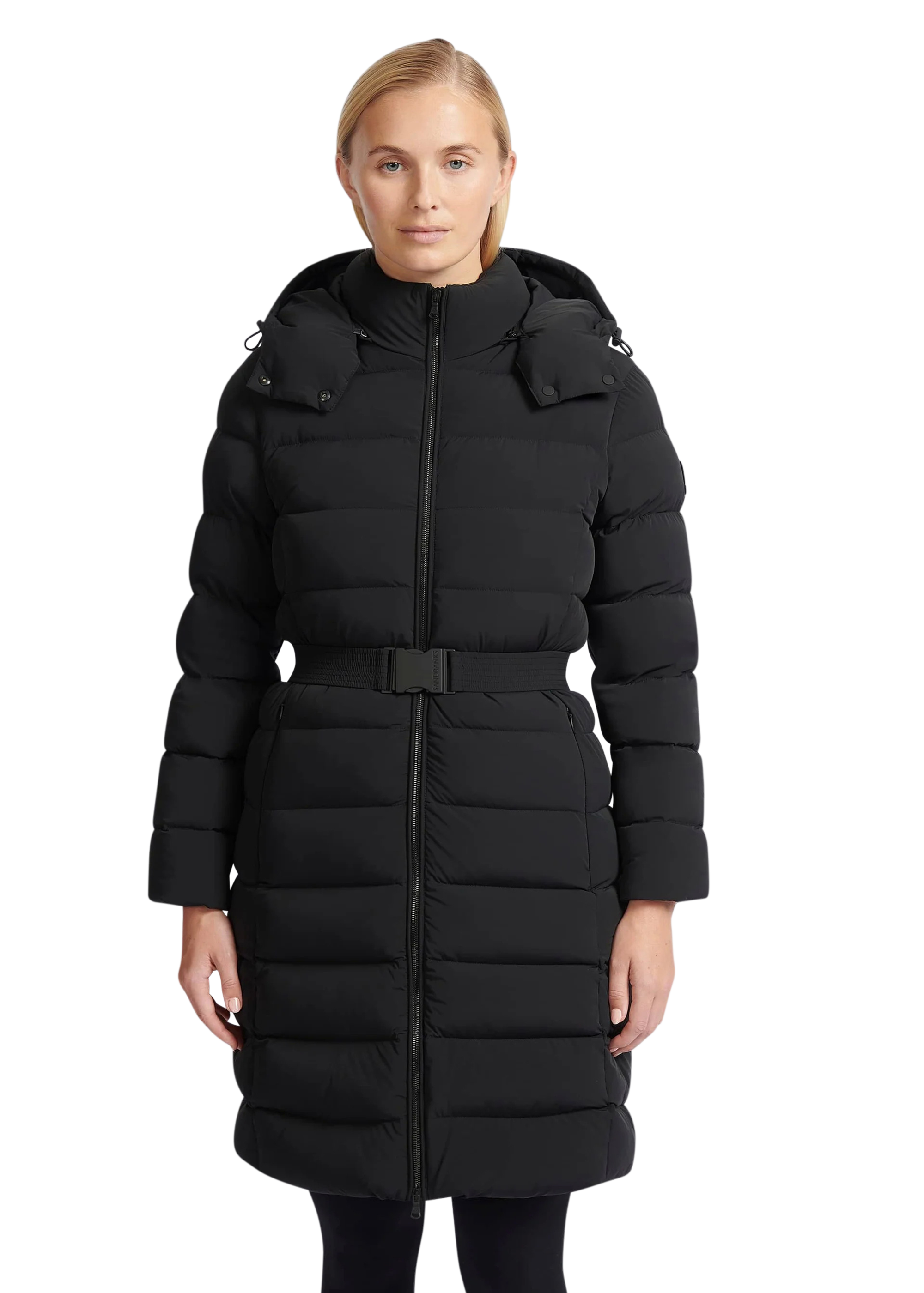 Woman wearing a black puffer coat on a white background