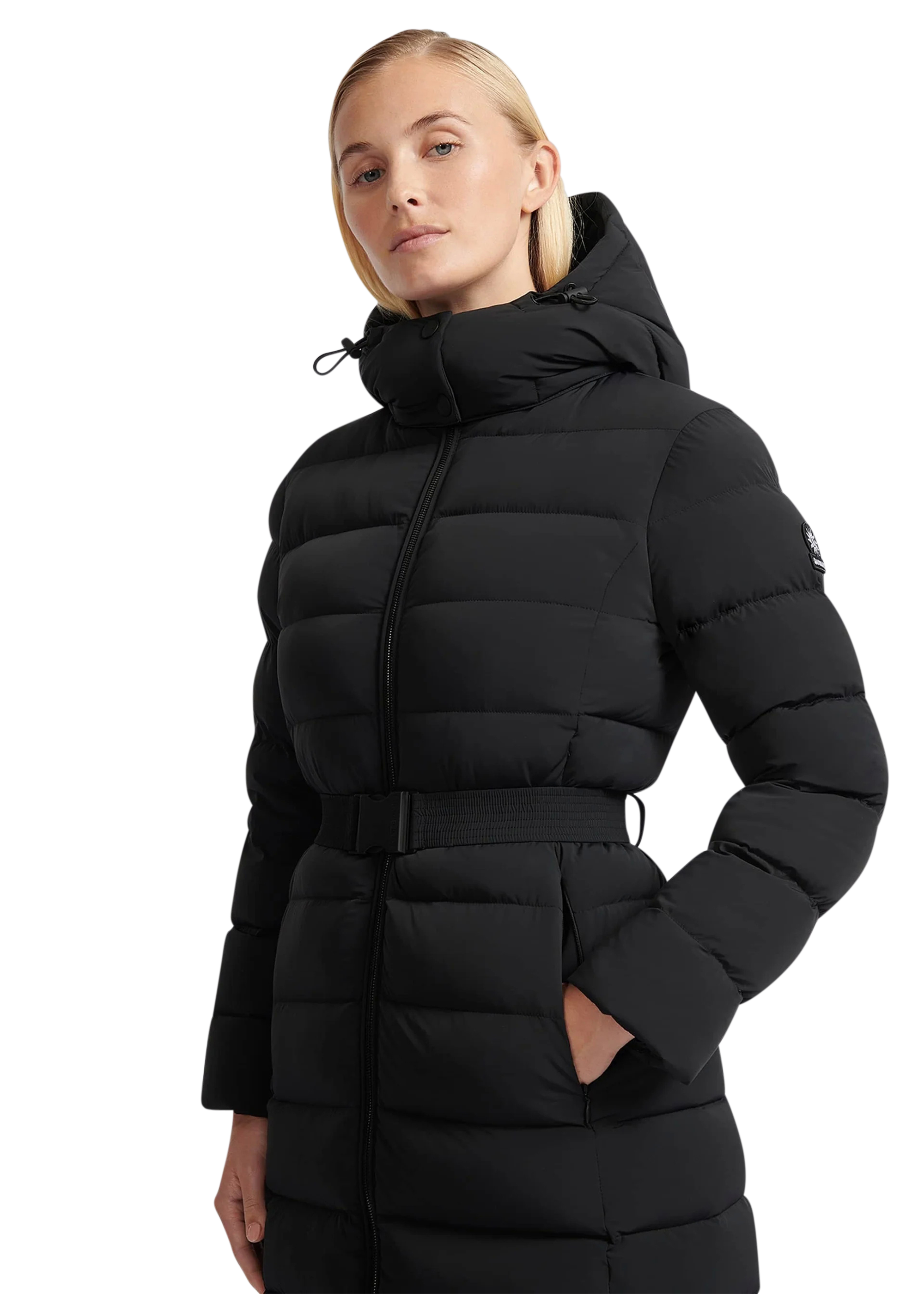 Woman wearing a black puffer jacket on a white background