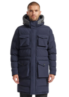 Man wearing a navy blue winter coat with a hood on a white background
