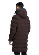Man wearing a brown puffer jacket on a white background