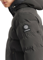 Gray puffer jacket with Sandbanks logo on a white background