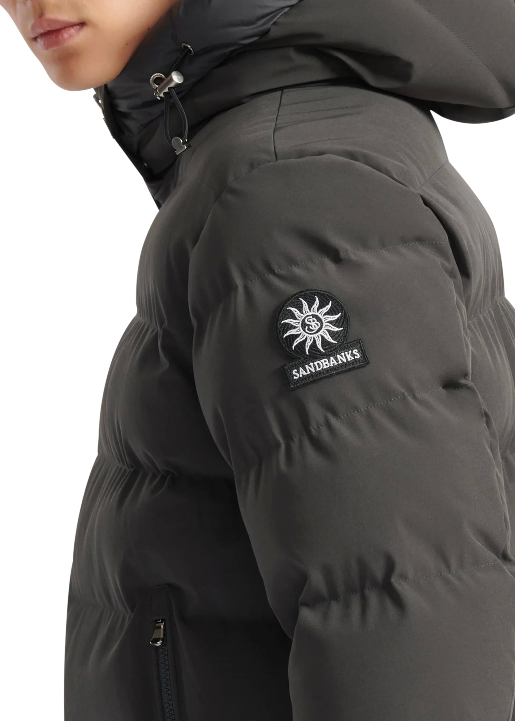 Gray puffer jacket with Sandbanks logo on a white background