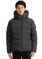 Man wearing a black puffer jacket on a white background