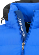 Blue puffer vest with a visible Sandbanks zipper