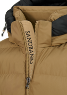Close-up of a brown and black jacket with a hood on a white background
