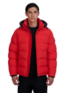 Man wearing a red puffer jacket on a white background