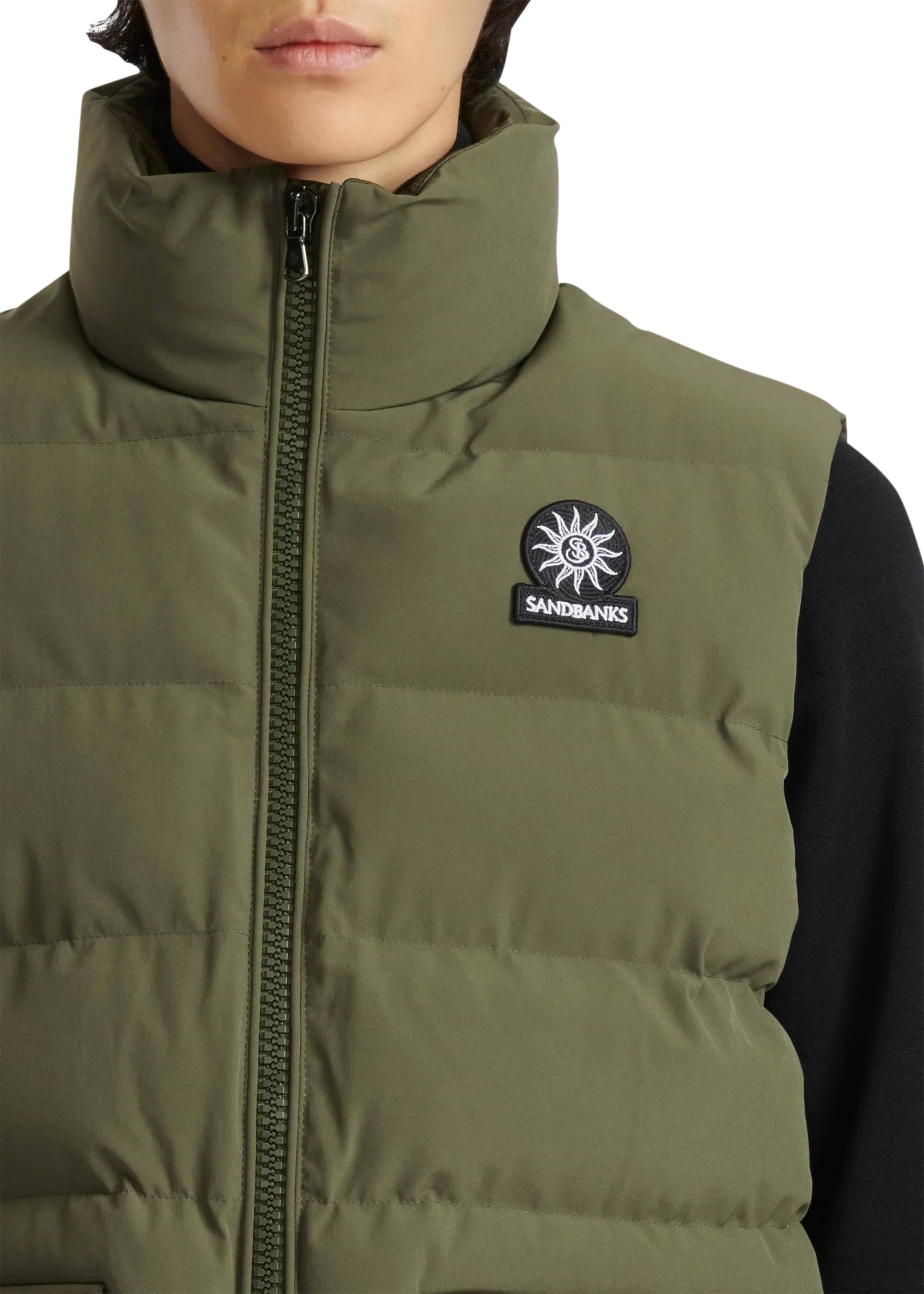 Green puffer vest with a logo on a white background