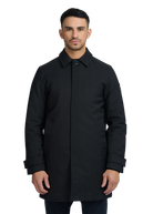 Man wearing a black coat on a white background
