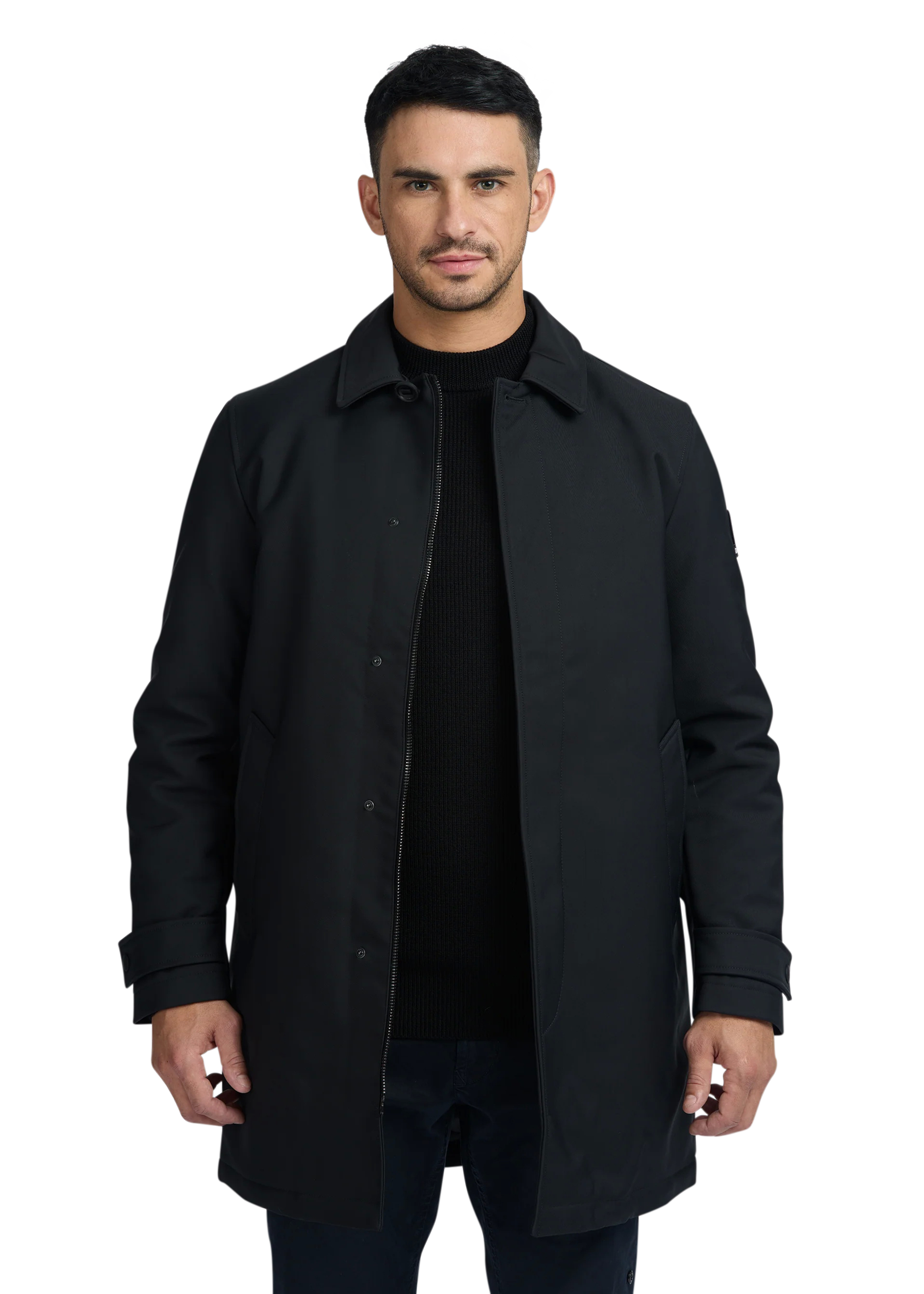Man wearing a black coat on a white background