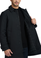 Man wearing a black coat on a white background