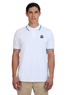 Model wearing a white polo shirt with a logo on a white background