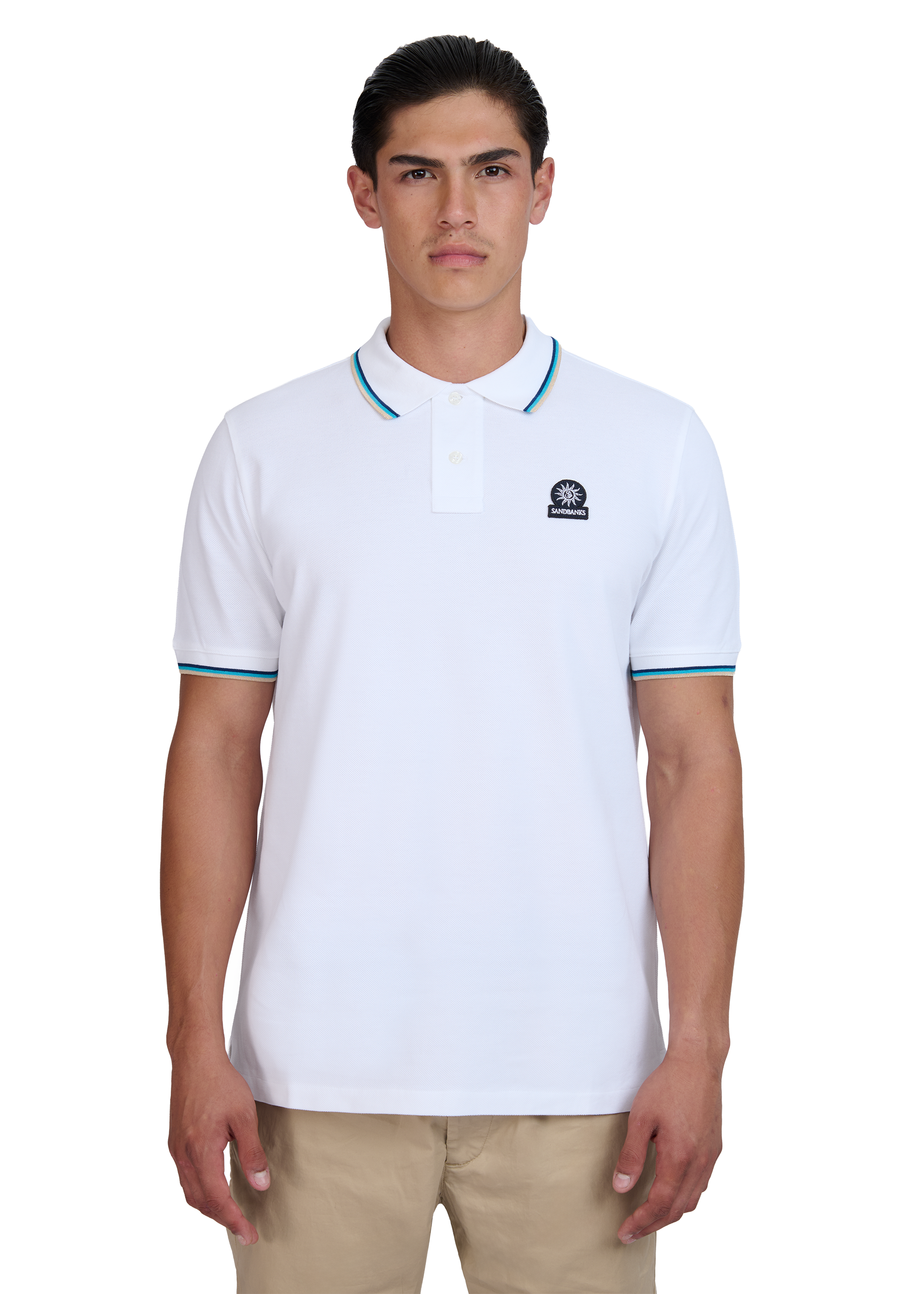 Model wearing a white polo shirt with a logo on a white background