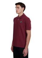 Model wearing Sandbanks Badge Logo Pique Polo Shirt - Port