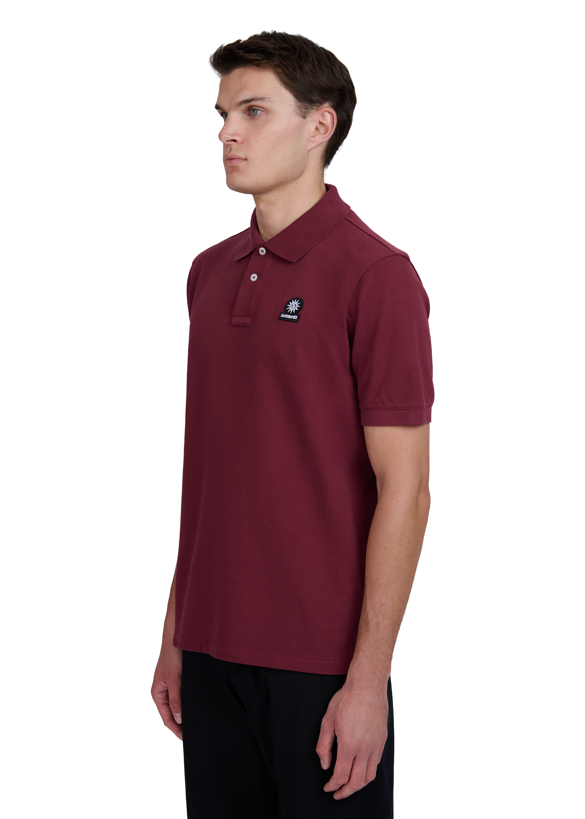Model wearing Sandbanks Badge Logo Pique Polo Shirt - Port