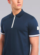 Navy blue polo shirt with white accents on a gray background