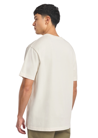 Model wearing a plain white t-shirt on a white background