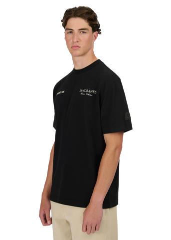 Model wearing Sandbanks Riviera Collection T-Shirt - Black