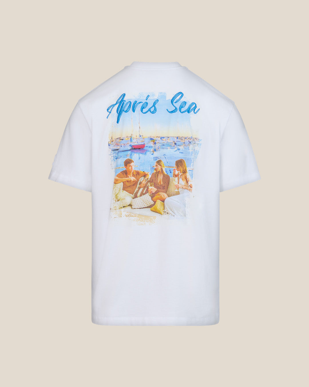 White t-shirt with a graphic of people by the sea and 'Apres Sea' text on a beige background