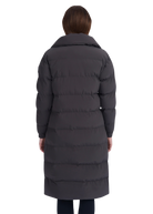 Person wearing a long dark gray puffer coat on a white background