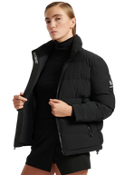 Person wearing a black puffer jacket with a brand logo on a white background