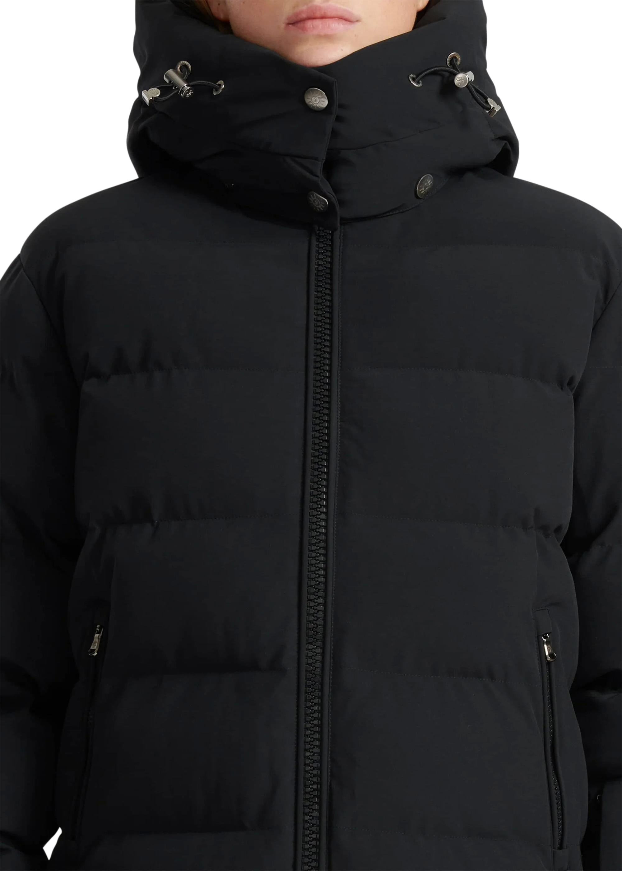 Close-up of a black puffer jacket with a hood on a white background