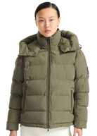 Person wearing a green puffer jacket on a white background