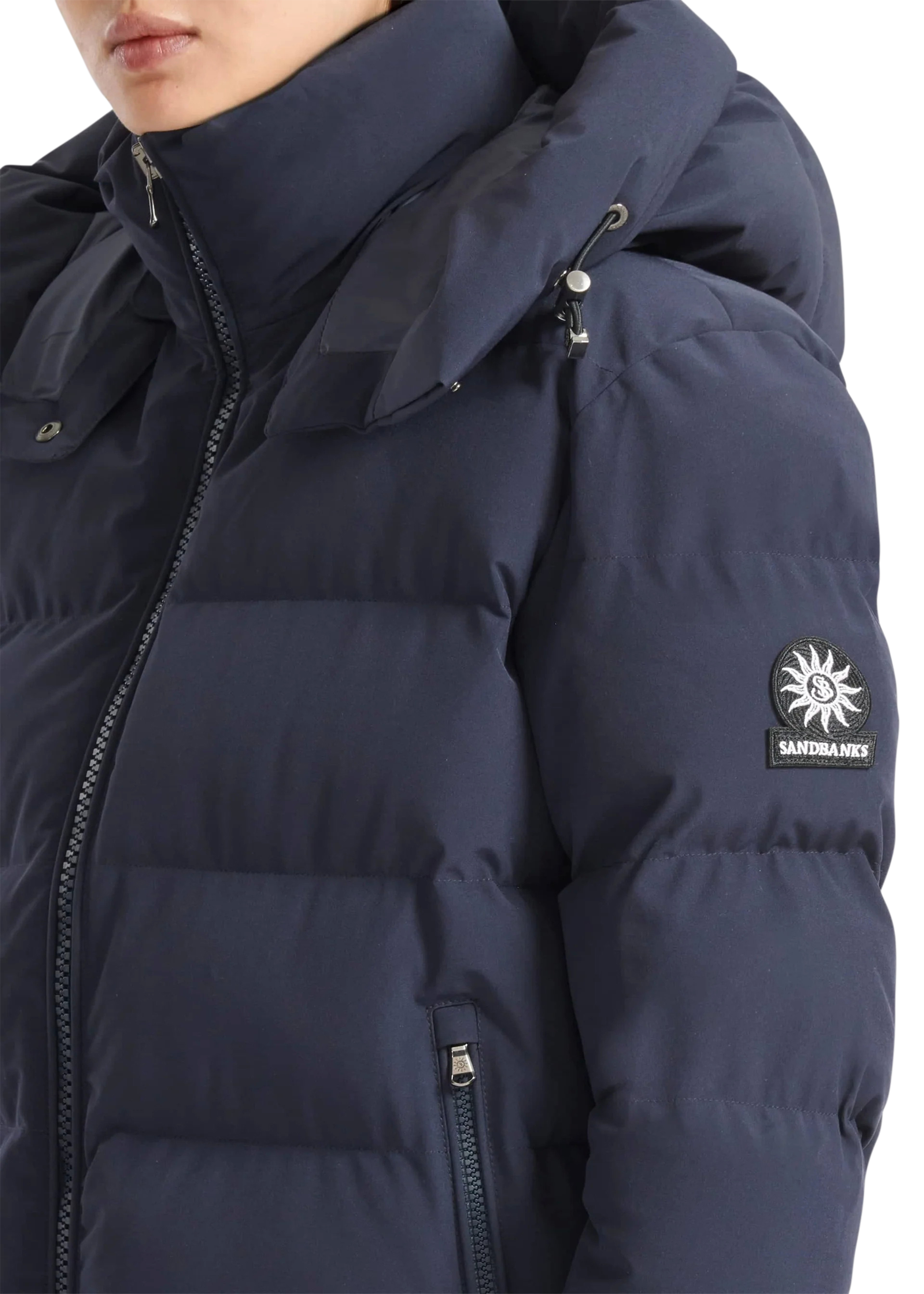 Navy blue puffer jacket with a brand logo on a white background