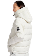 Person wearing a white puffer jacket with a brand logo on a white background