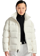 Person wearing a white puffer jacket with a visible brand logo on a white background