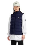 Person wearing a navy puffer vest over a white shirt with a visible brand logo on a white background