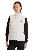 Person wearing a white puffer vest with a brand logo on a white background