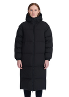 Person wearing a black long puffer coat on a white background