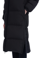 Black puffer coat on a white background