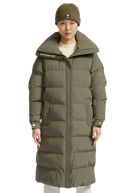 Person wearing a long green puffer coat with a brand logo on a white background