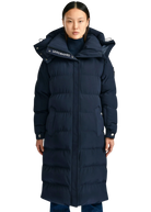 Person wearing a long navy blue puffer coat with a brand logo on a white background