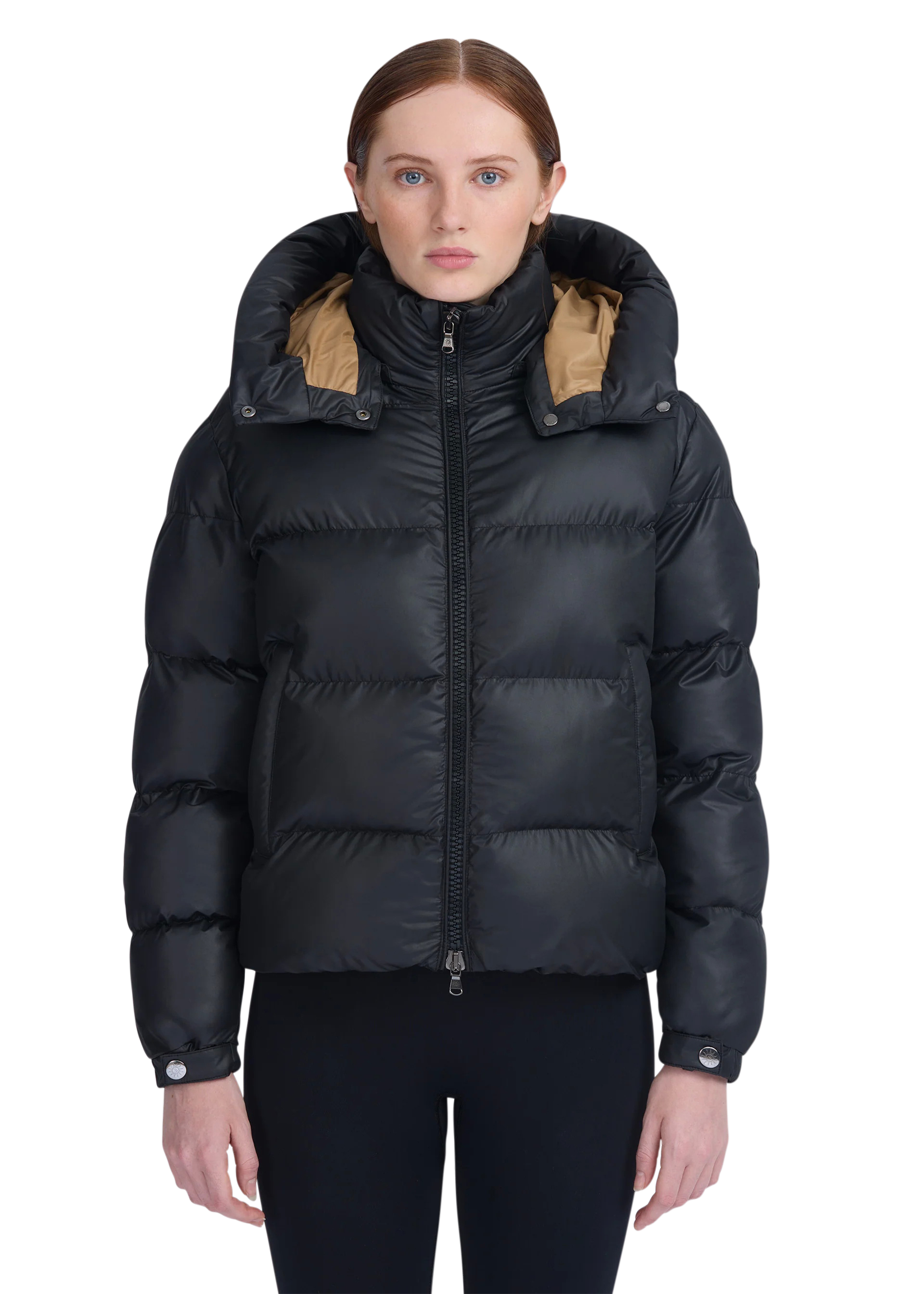 Black puffer jacket with brown hood on a white background