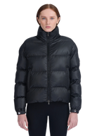 Black puffer jacket worn by a model on a white background